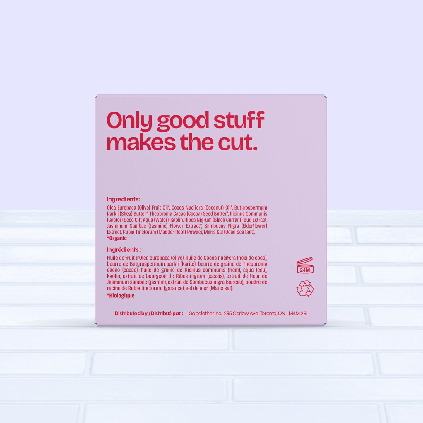 A bold red and pink box for Goodlather’s Black Currant and Jasmine Bar Soap displays “Only good stuff makes the cut.” in bold red. Organic ingredients are shown below, all set on a white tile background.